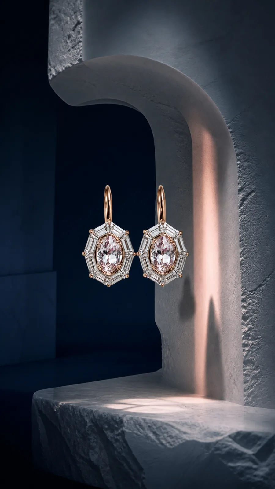 Pink diamond earrings in a carved stone setting
